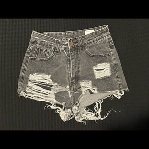 Black jean shorts by Shein. Very short.